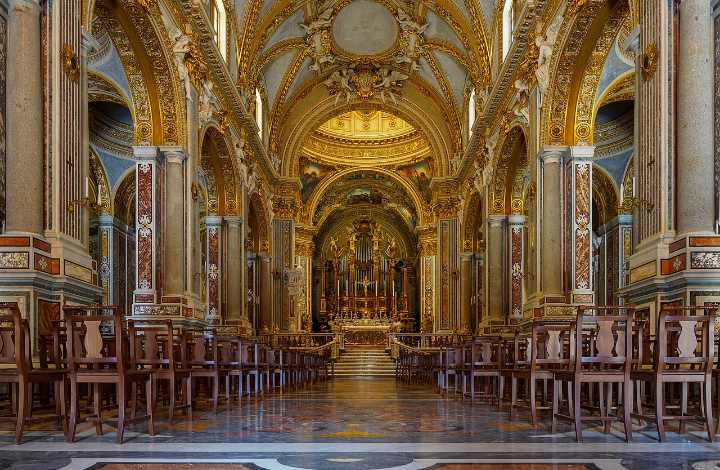 Golden baroque vaults and central aisle of the Basilica at Montecassino